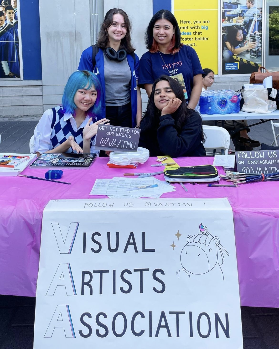 Image of Apurba and fellow VAA club members tabling on campus for the club.